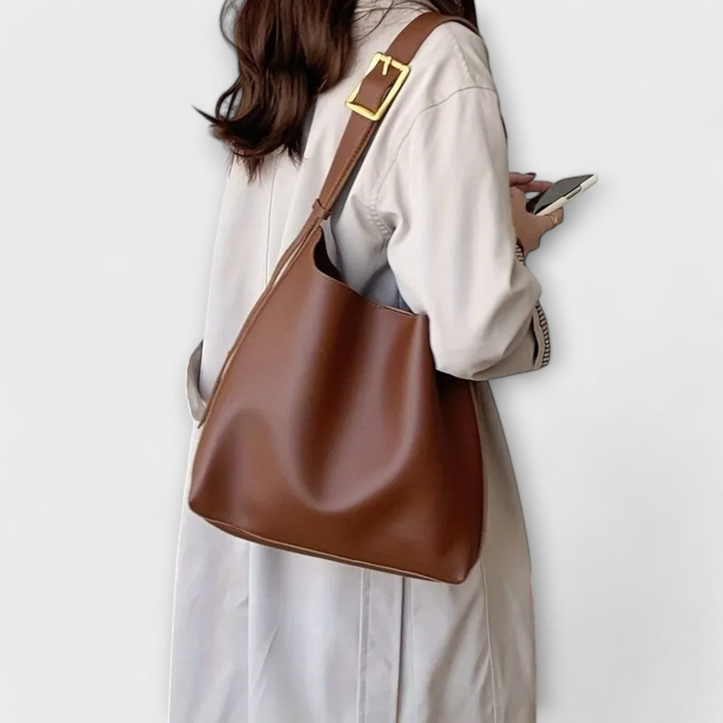 Aurora. – Elegante bolso de cuero para el hombro - vittoria stile